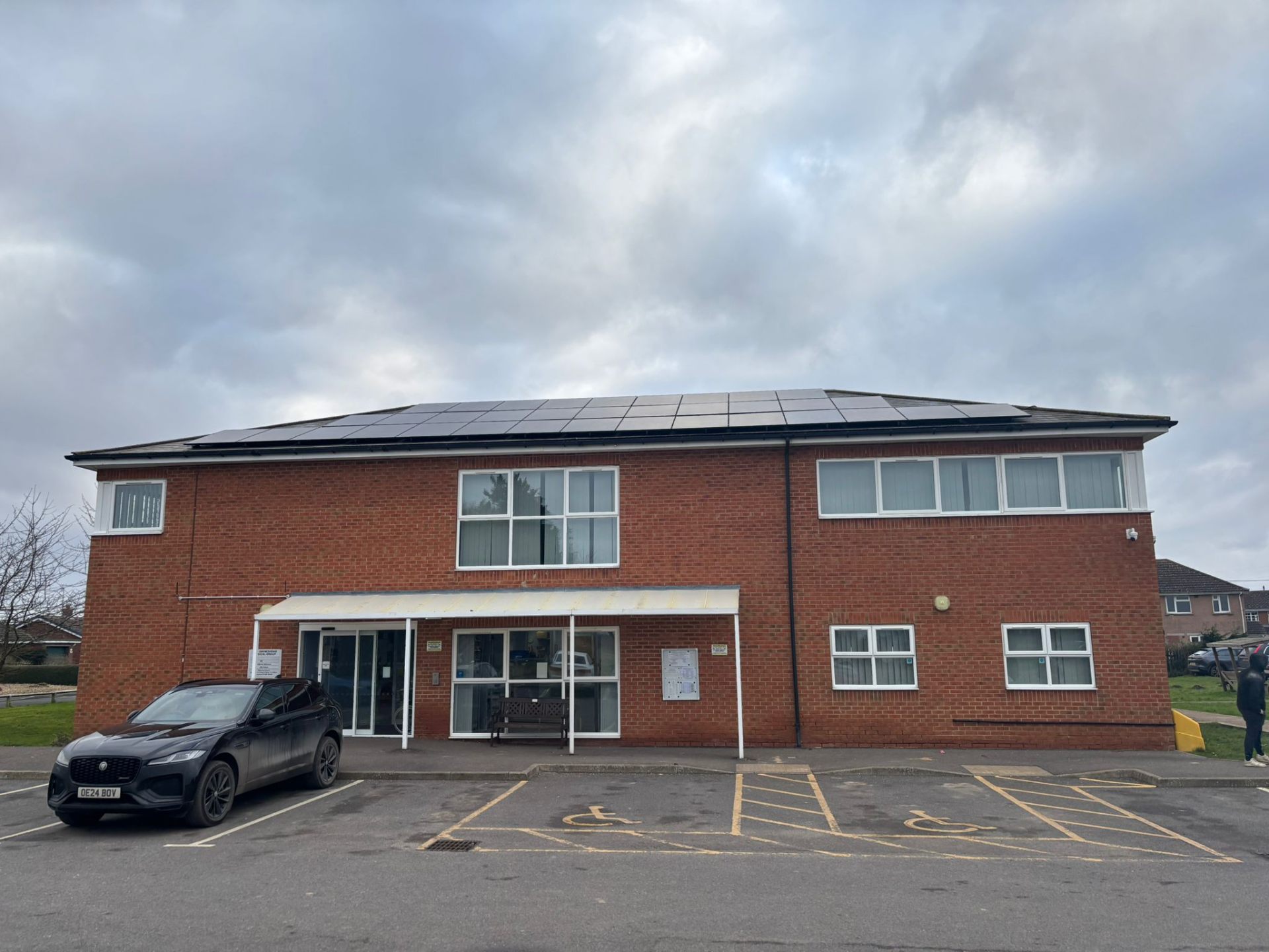 Commercial solar installation Swineshead Medical Group front entrance with completed solar panel system