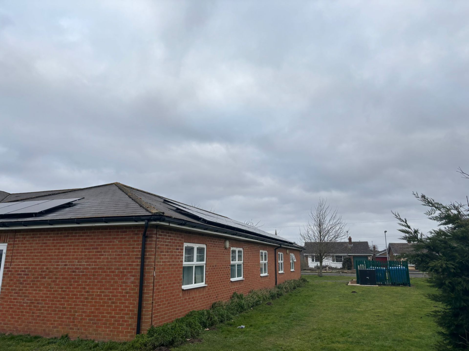 Commercial solar installer rear building view of completed solar panel installation at Swineshead Medical Group